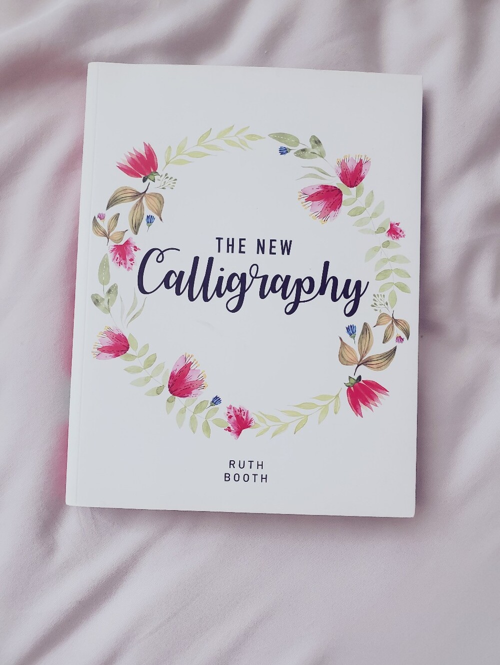 The New Calligraphy Book - White with Pink Floral Cover. Extensive + Creative